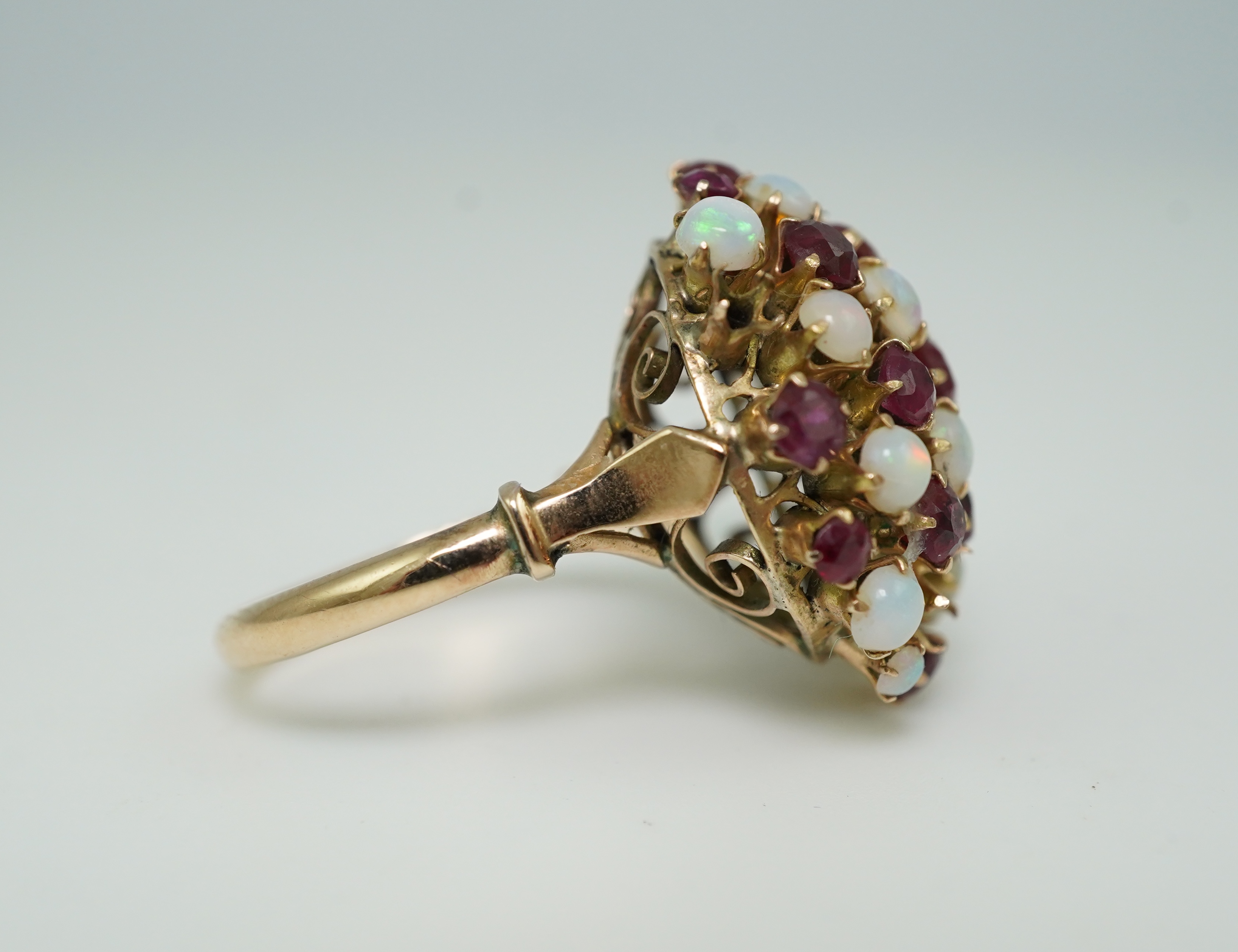 A ruby and opal cocktail ring, mid 20th century